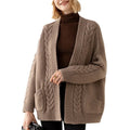 Pull mi-long en maille torsadée ample à col en V pour femme