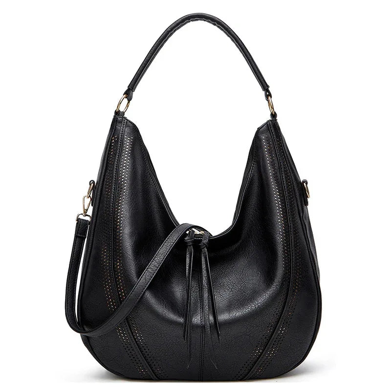 Sac à bandoulière fourre-tout tendance rétro grande capacité avec gland et motif ajouré pour femme