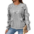 Pull gris décontracté à col rond pour femme avec nœud papillon brodé