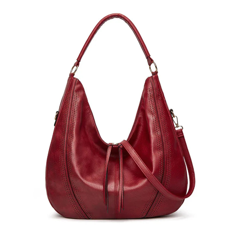 Sac à bandoulière fourre-tout tendance rétro grande capacité avec gland et motif ajouré pour femme