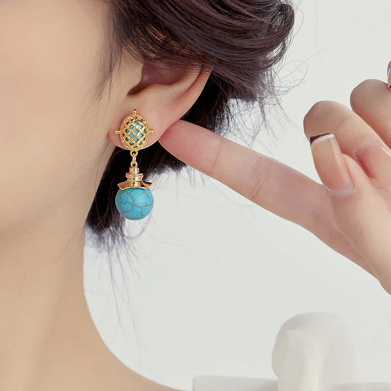 Boucles d'oreilles pendantes longues en argent et turquoise pour femme