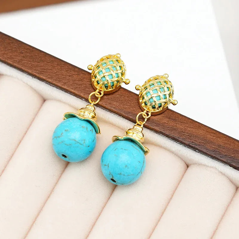 Boucles d'oreilles pendantes longues en argent et turquoise pour femme