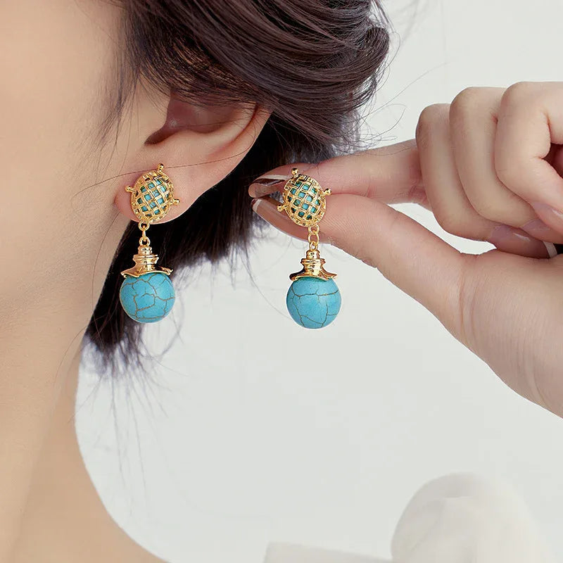 Boucles d'oreilles pendantes longues en argent et turquoise pour femme
