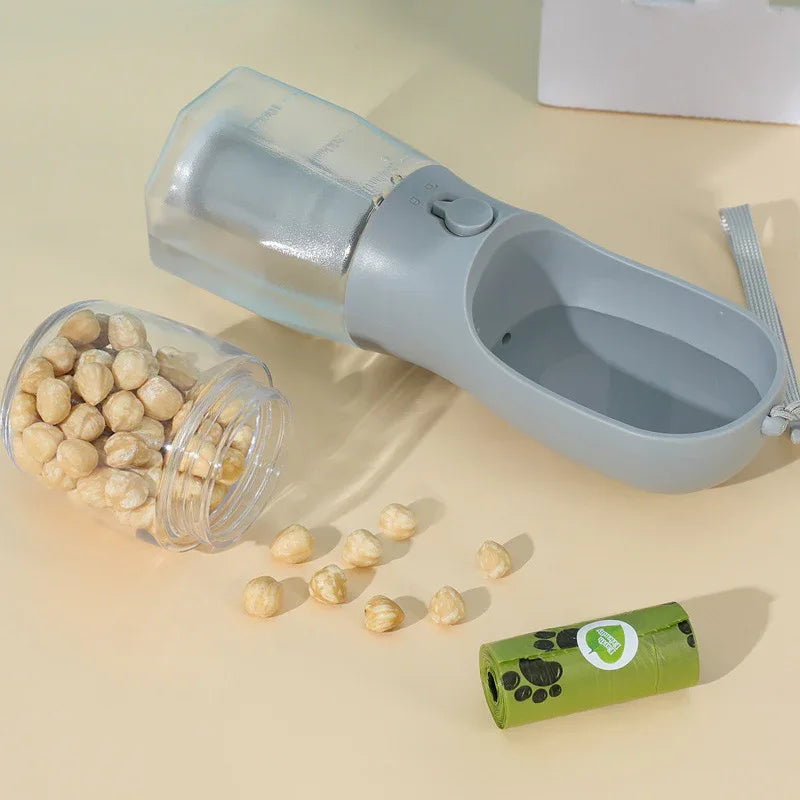 Gobelet à eau pour chien, compartiment pour sacs poubelles, distributeur de nourriture, bouteille d'eau portable multifonction trois-en-un pour petits animaux de compagnie