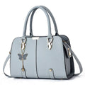 Sac à main femme en cuir PU tendance avec pendentif papillon